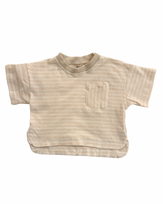 Beige striped t-shirt with a pocket on a white background