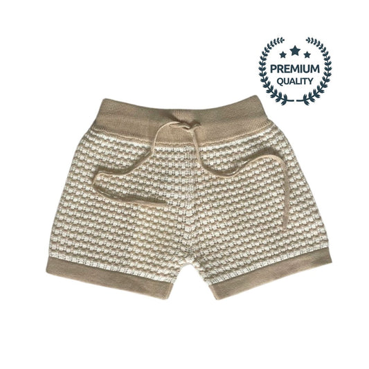 Beige shorts with a textured knit stitch on a white background, featuring a 'Premium Quality' label.