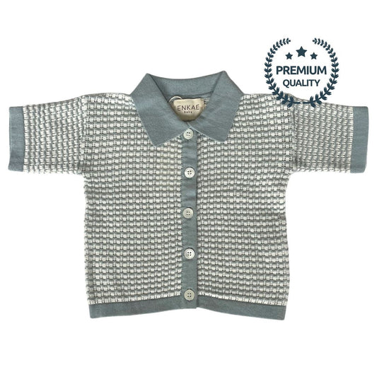 Children's cardigan with a knitted textured pattern on a white background, featuring the brand 'ENKAE'.