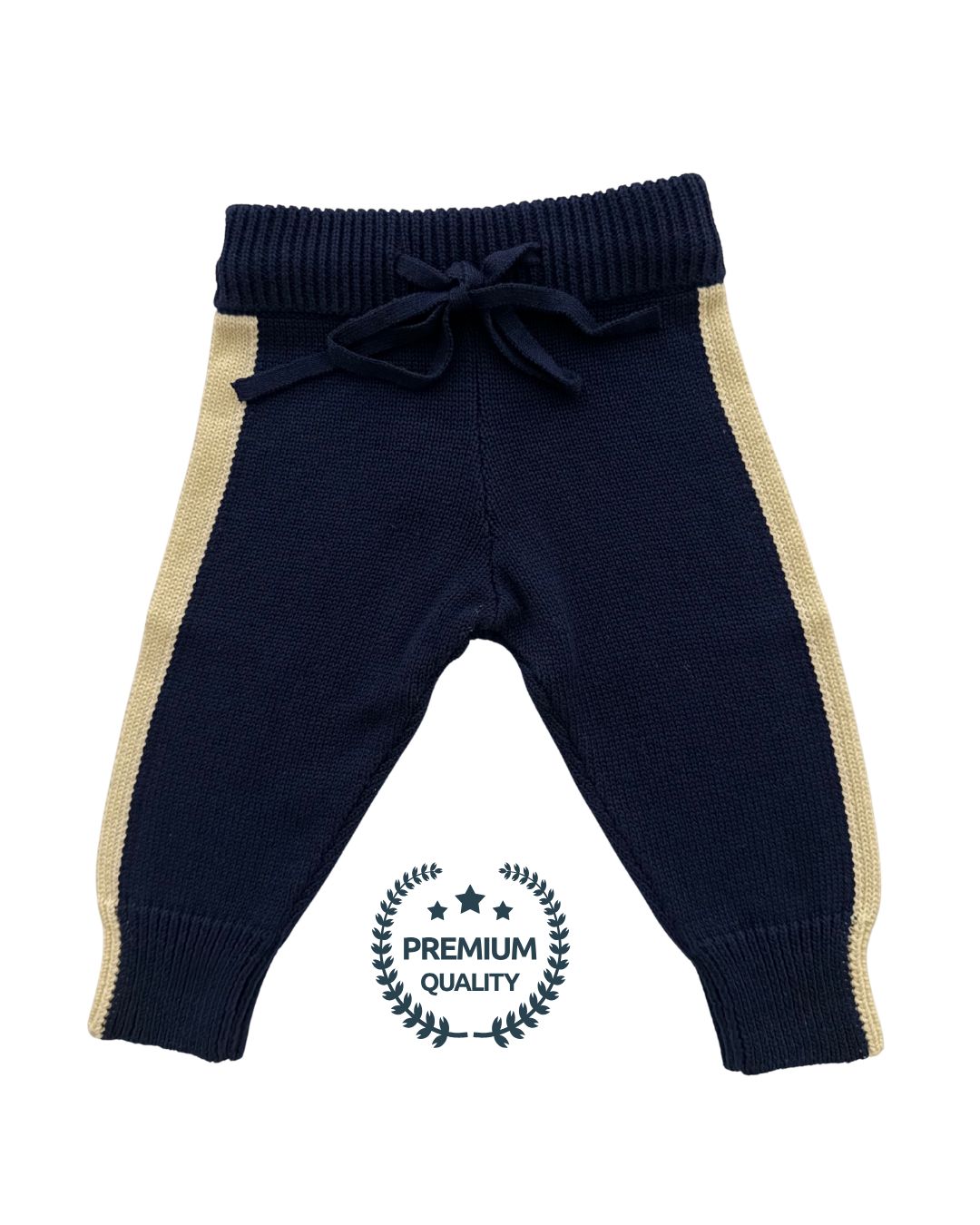Navy blue baby pants with beige stripes on a white background, featuring a 'Premium Quality' label.