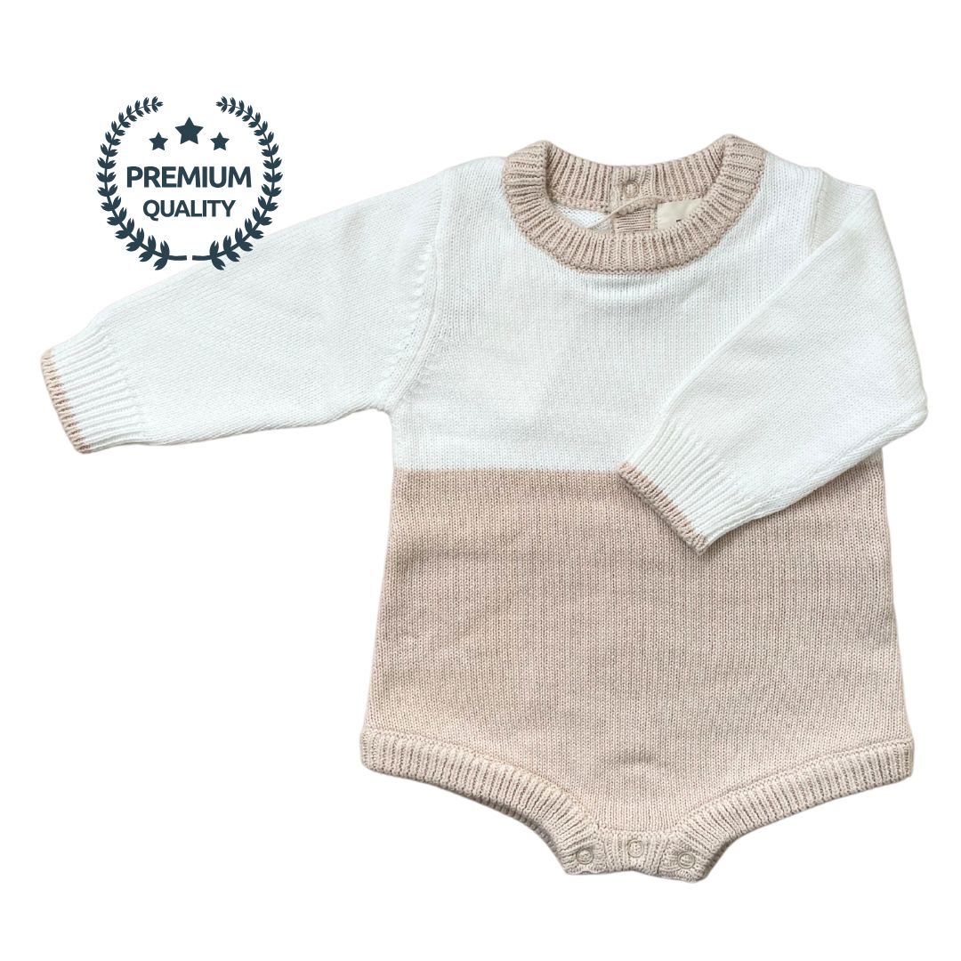 A stylish color block romper in ivory and beige, crafted from 100% premium cotton. Designed with a beige collar and sleeve hems for a subtle contrast, this cozy, oversized fit grows with your little one.